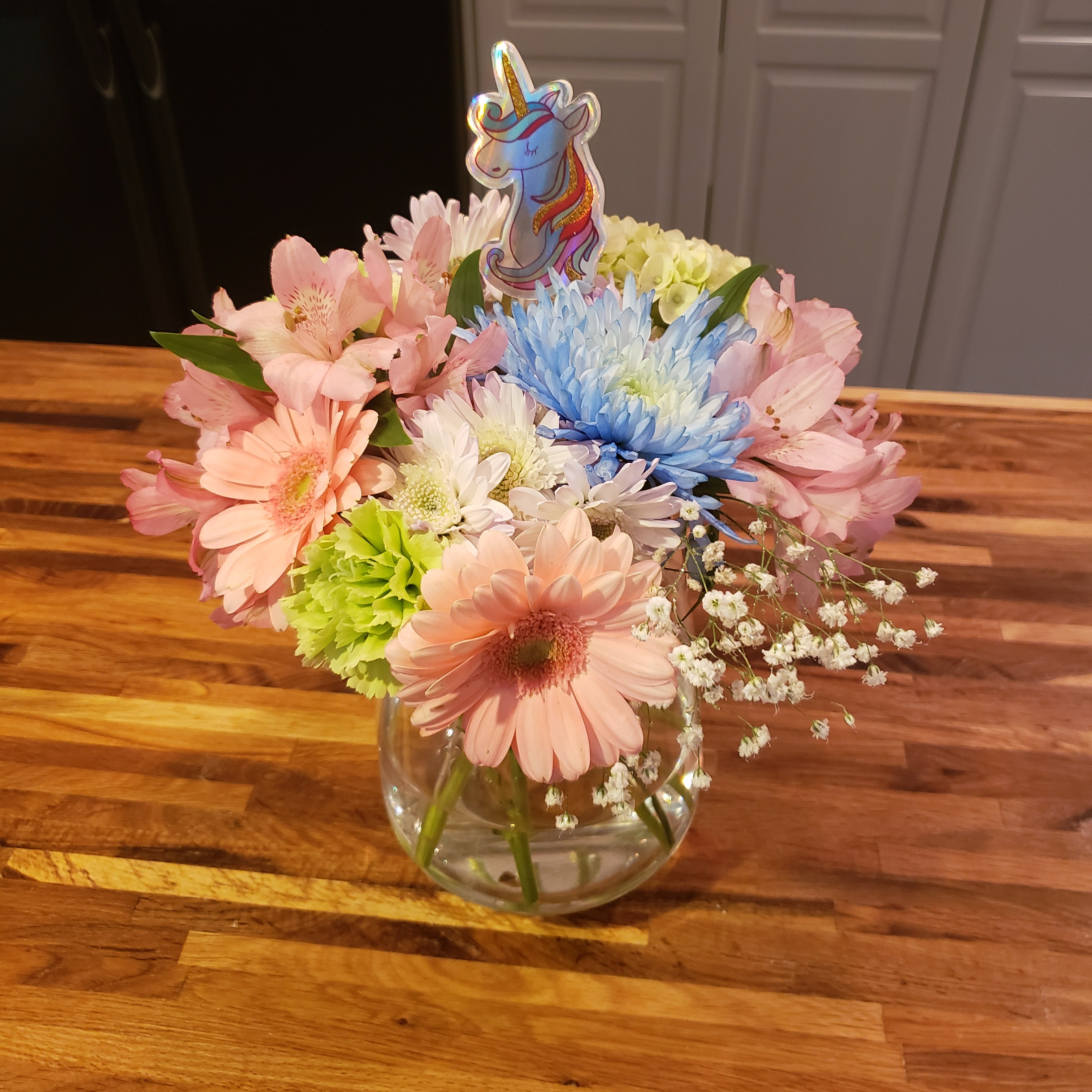 Pastel flowers make up a unicorn-colored bouquet.